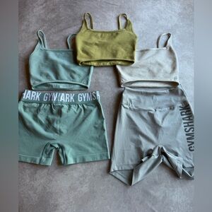 Gymshark Women's Olive and Gray Bike Shorts and tops.